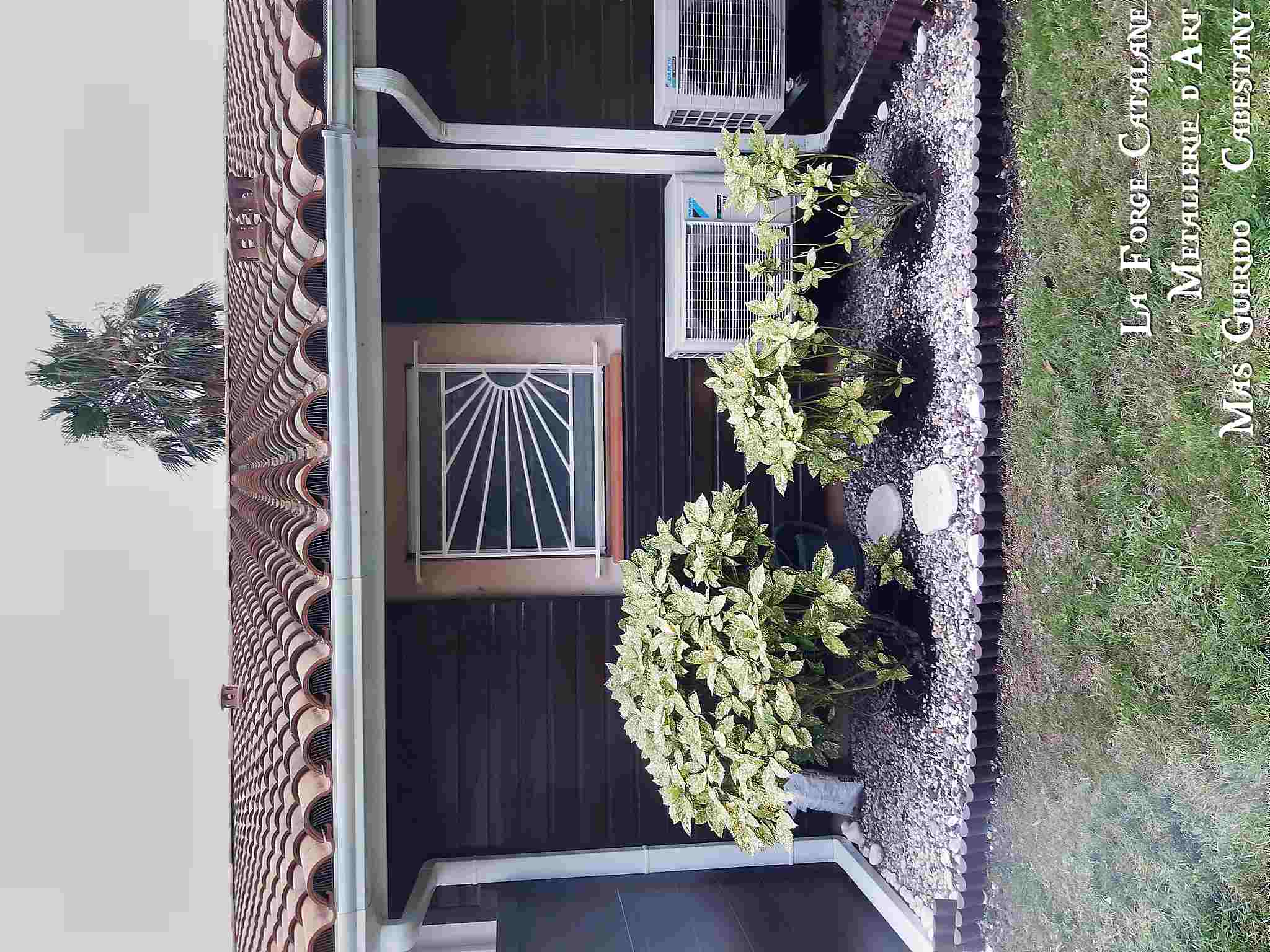 grille de protection decoupe laser soleil thermolaquage forge catalane.jpg